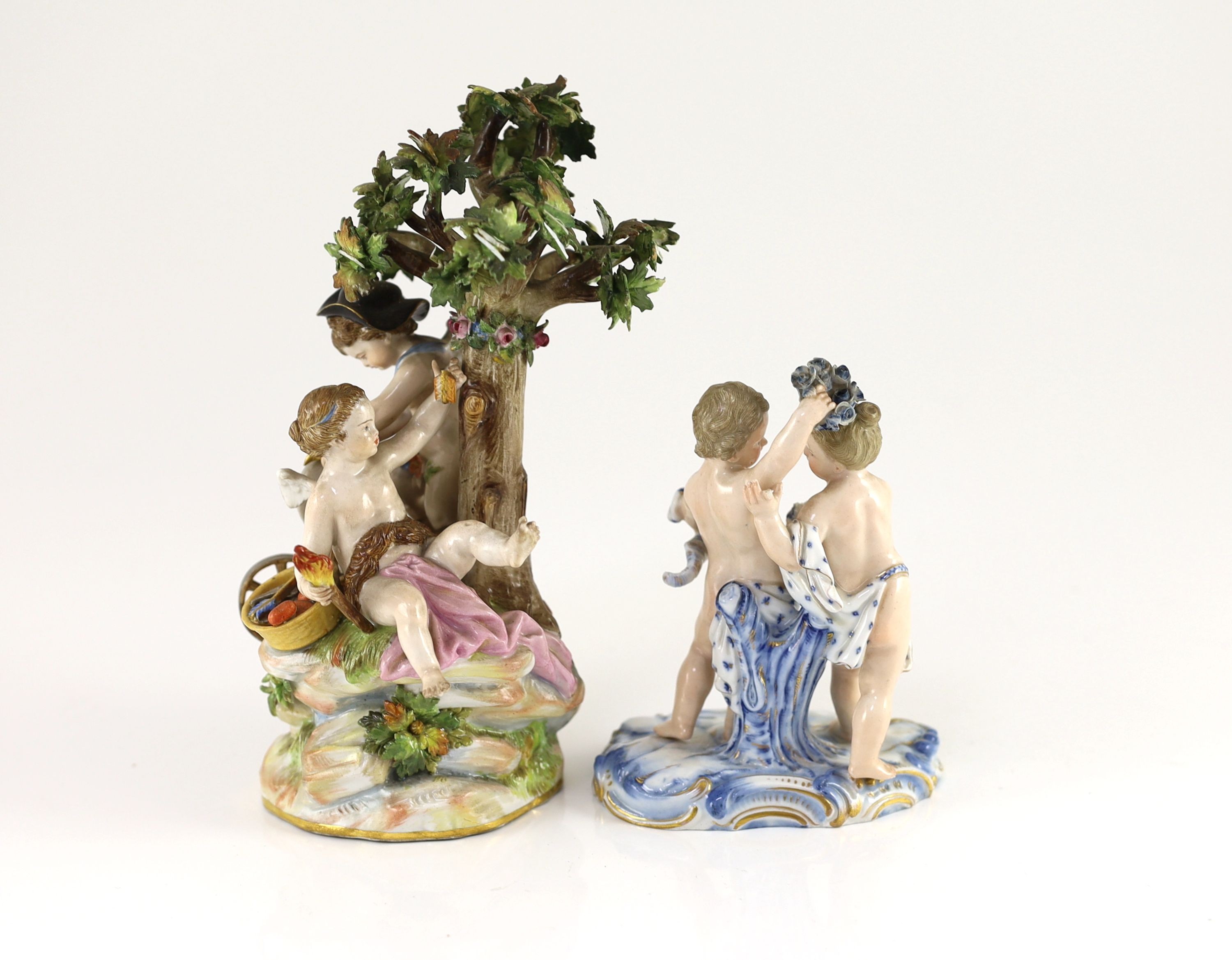 A Meissen group of Cupid forging arrows and a similar group of two cherubs, late 19th century, 20 cm and 13cm high